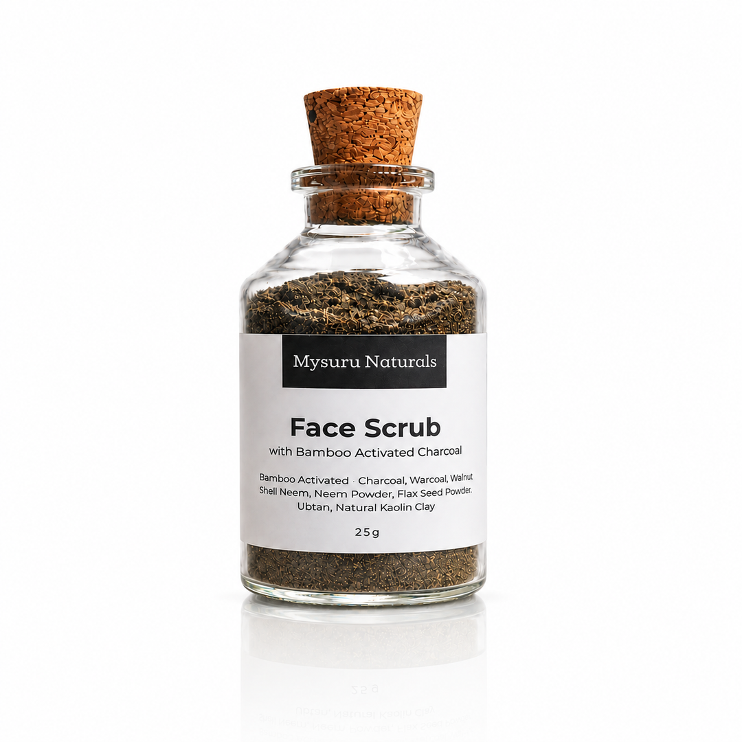 Glass jar of Mysuru Naturals Face Scrub with cork lid on a white background