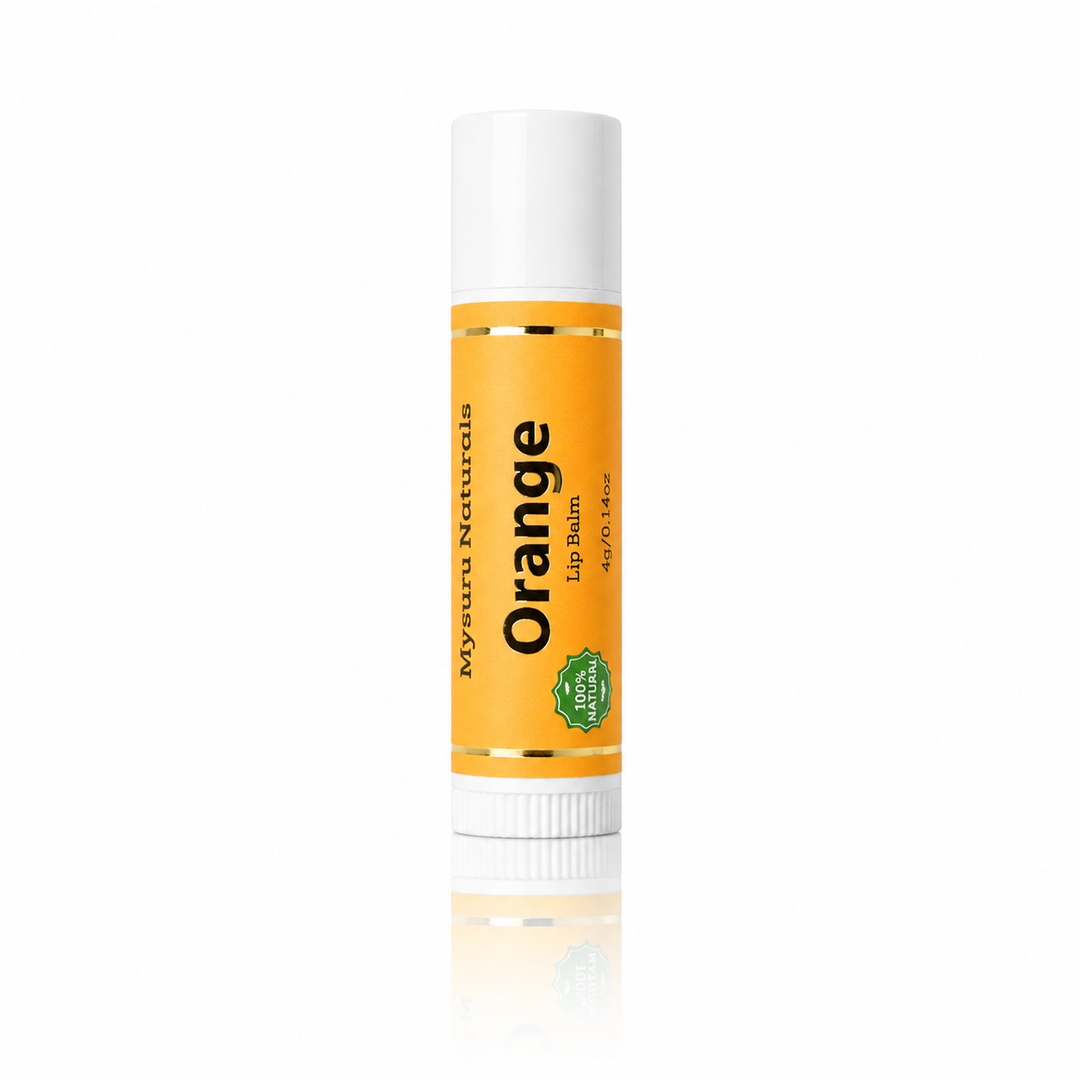 Orange lip balm with a white cap on a white background