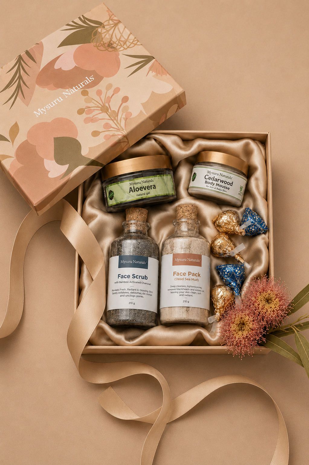 Skincare product set with jars and bottles in a decorative box on a beige background
